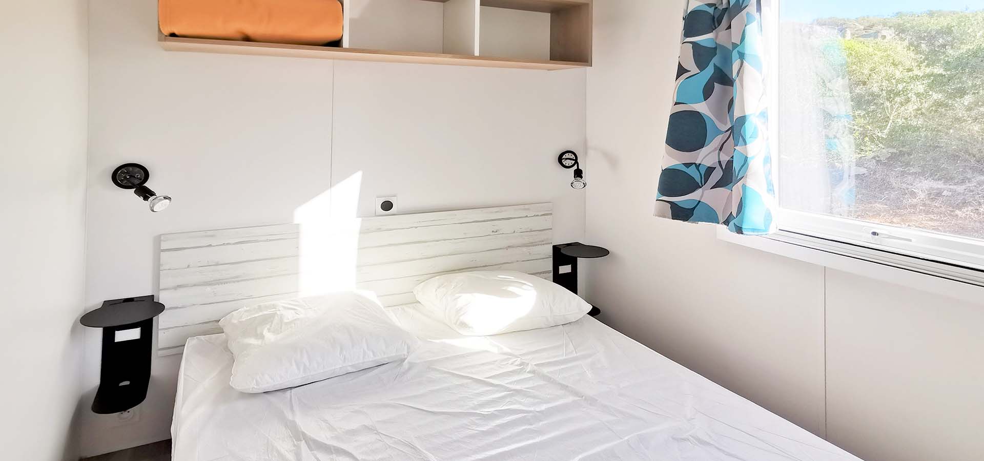 Camping kevano bungalow castagno chambre principale