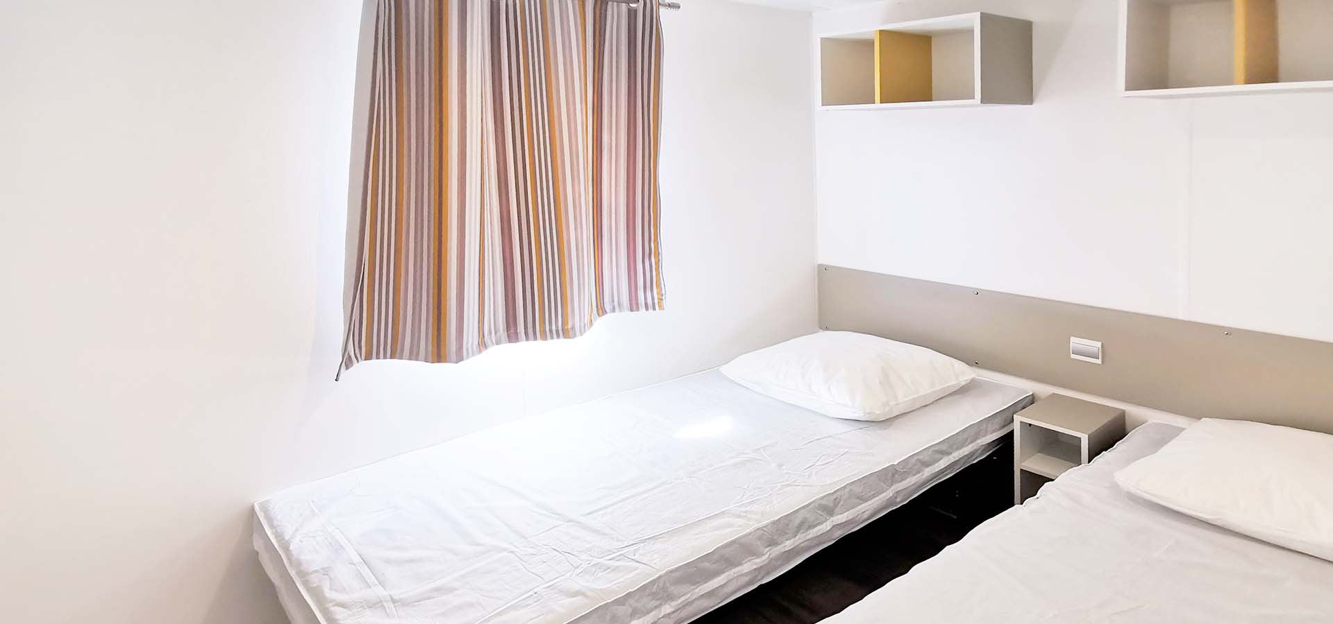Camping kevano bungalow myrte chambre enfant