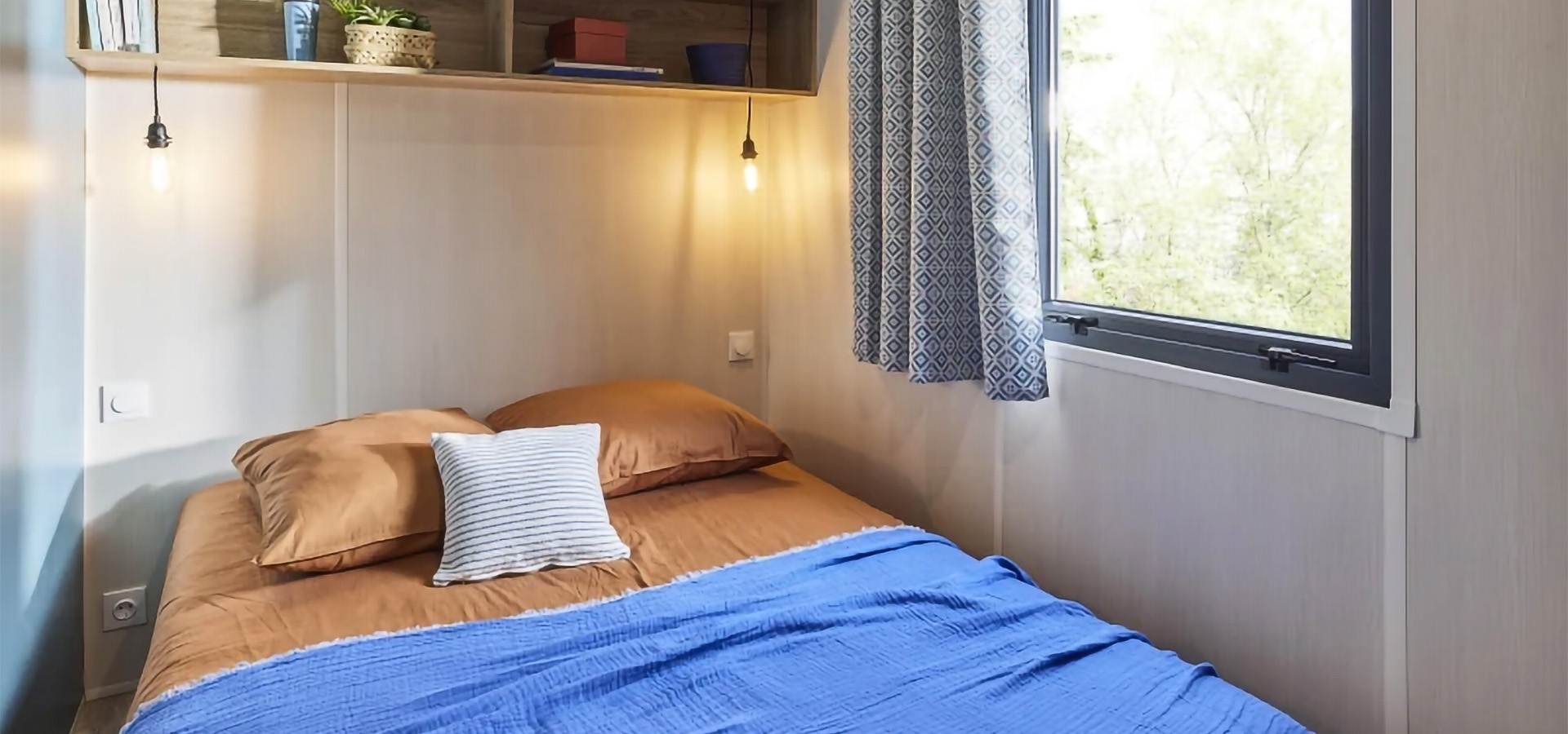 Camping san damiano bungalow dolce chambre principale